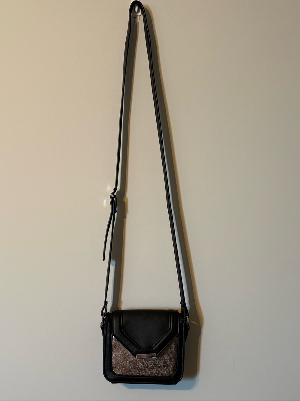 Micro black crossbody snap bag with metallic front